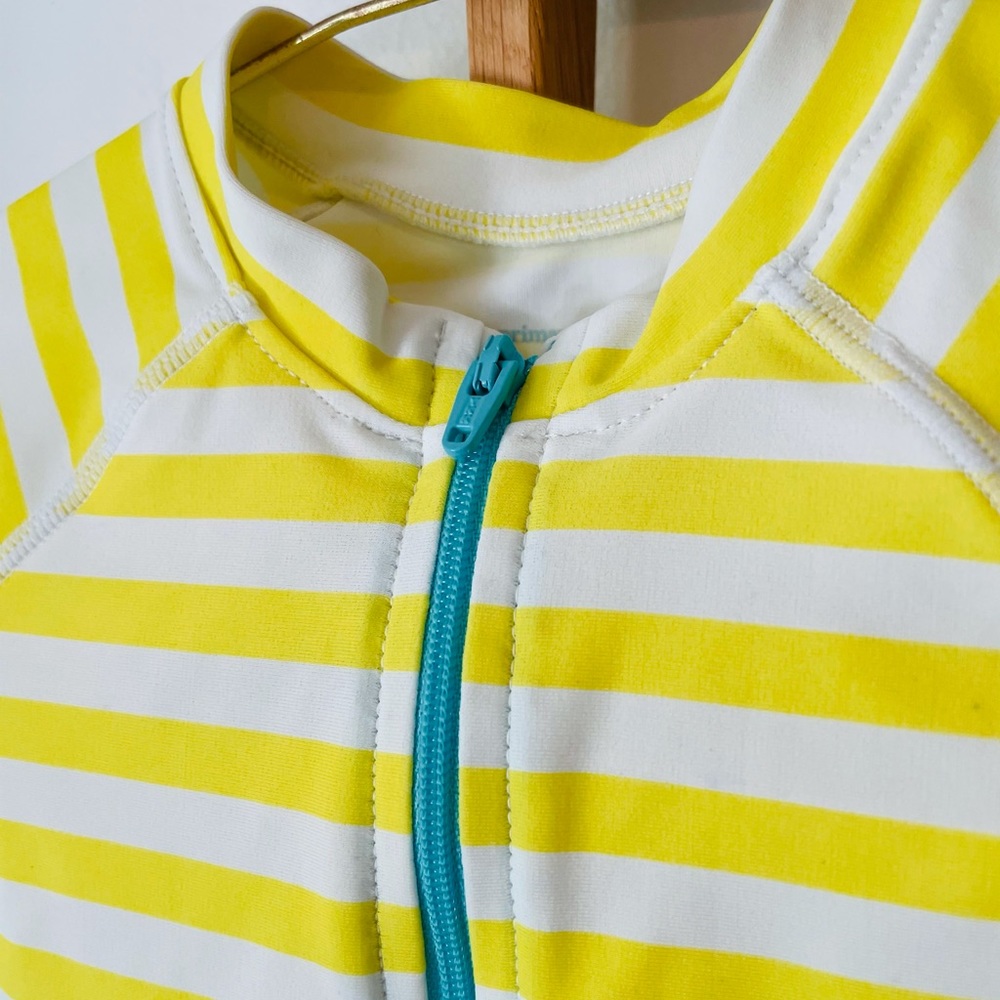 Primary stripe one-piece rash guard